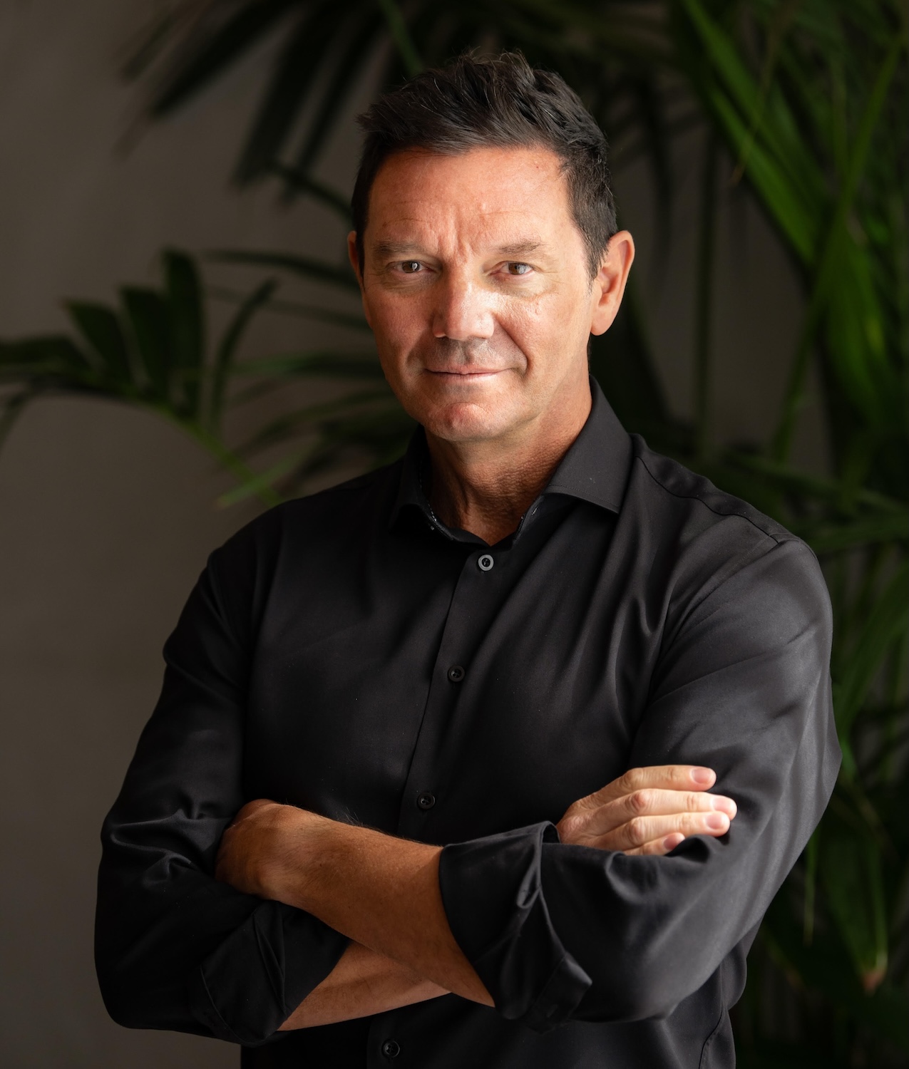 close cropped black and white headshot of Dr. Jeffrey Sanchez-Burks